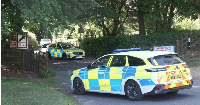 Police were still outside the house of Ann Widdecombe in Haytor in Dartmoor on Monday