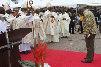 Mahama bowing before Catholic bishops