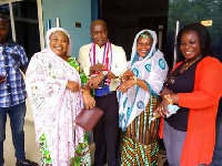 Mr Stephen Ayesu Ntim with some female supporters