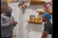 Dr Mahamudu Bawumia interacting with Chef Faila in her kitchen