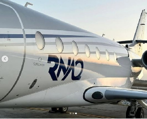 Richard Nii-Armah Quaye's private jet, boldly branded with his initials, RNAQ