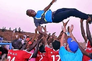 Kwesi Appiah held shoulder high by his players