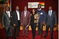 The Ambassador,Dr. Barfour Adjei-Barwuah,(middle) with some of the newly sworn members