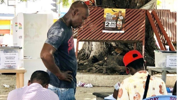 A citizen having his Ghana Card checked