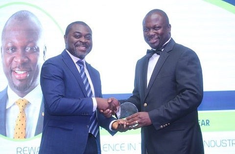 John Awuah (right) taking his award