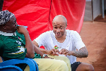 Photo of Abedi Pele and Dede Ayew sharing heartwarming father-son moment warms hearts
