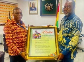 Prof. Kingsley Nyarko (left) presenting a citation to NAPO