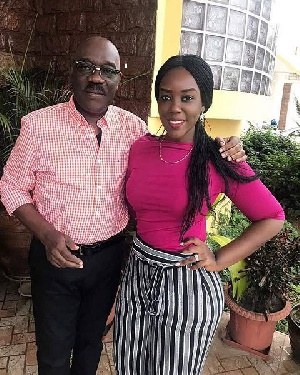 This recent photo of Louisa and her father shows that the dentist is not pregnant