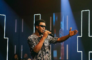 Romeo Swag photographed while performing at an event