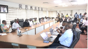 Stakeholders engaged in a meeting on the Maritime Single Window program