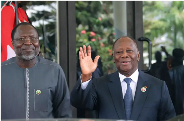 Omar Touray, president of the ECOWAS Commission, left, and Ivory Coast President Alassane Ouattara