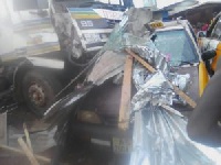 The mangled truck and taxi