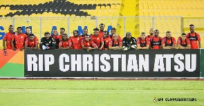 The Black Stars players paying a tribute to Christian Atsu