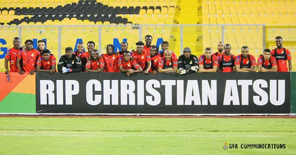 The Black Stars players paying a tribute to Christian Atsu