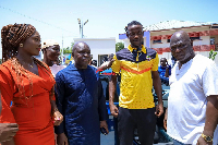 Benjamin Asare (M) and his coach Aboubakar Ouattara (R) during the presentation