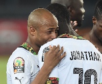 File photo: Jonathan Mensah hugs Dede Ayew