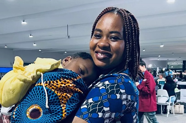 Adjoa carried her one-year-old son on a remarkable 10,000km journey from Ghana to Azerbaijan