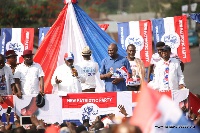 Nana Akufo-Addo with other NPP members addressing electorates during a campaign
