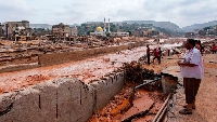 People looking at the damage caused by freak floods in Derna, eastern Libya, on September 11, 2023