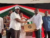 Kwame Asiemoah Jr (L) making the presentation