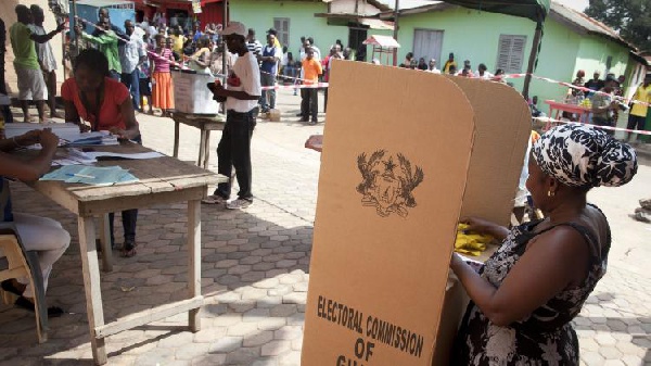 Woman casts her ballot.     File photo.