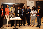 The executives of Travelport and AWA cutting the cake to solidify the partnership
