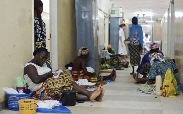 File photo of mothers sitting on the floor at a hospital