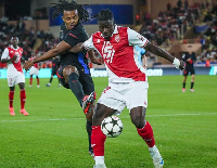 Monaco defender, Mohammed Salsu ( in red and white)