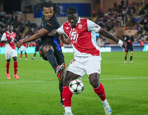 Monaco defender, Mohammed Salsu ( in red and white)