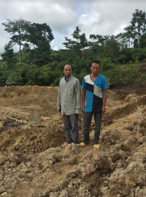Two of the suspected Chinese illegal miners arrested at the site