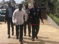 Daniel Asiedu (white shirt) and Vincent Bosso arriving in court on Thursday