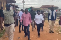Prof Jane Naana Opoku-Agyemang (middle, in white) at a polling station in Assin North