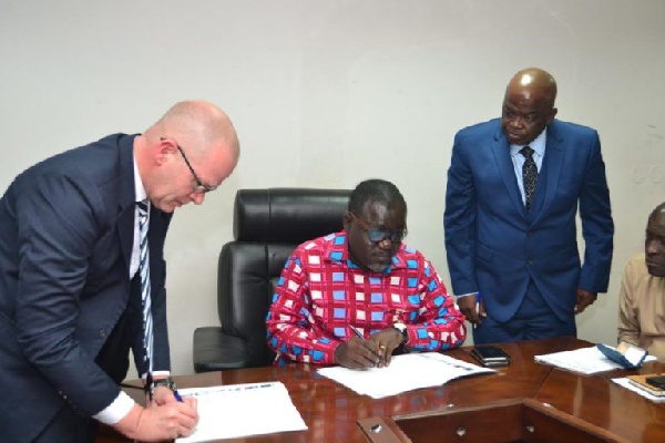 Stakeholders involved signing the documents