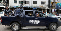 Police officers patrol during the gubernatorial and state Assembly elections in Lagos, Nigeria, 2023