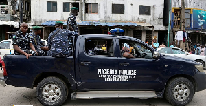 Police officers patrol during the gubernatorial and state Assembly elections in Lagos, Nigeria, 2023