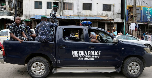 Police officers patrol during the gubernatorial and state Assembly elections in Lagos, Nigeria, 2023