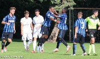 Bright Gyamfi, right spotting number 2 jersey, celebrates a goal with his team-mate