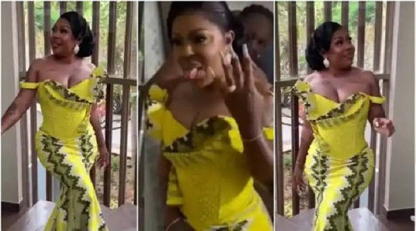 Videos and images shared on social media Afia adorned in a beautiful yellow dominated Kente dress