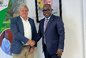 Tom Norring (L) with the Minister of Climate Change and Sustainability, Issifu Seidu (R)