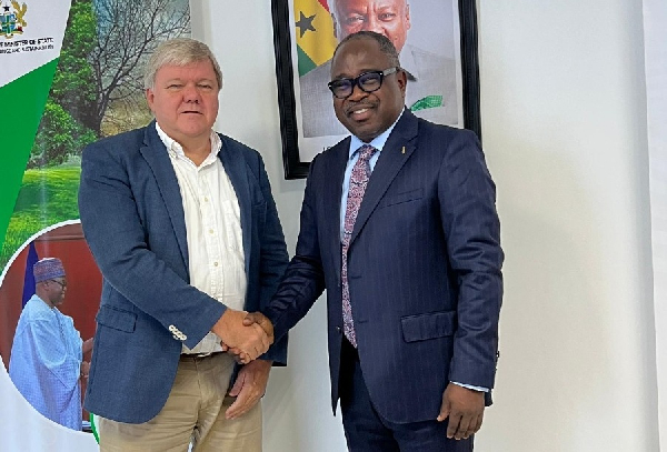Tom Norring (L) with the Minister of Climate Change and Sustainability, Issifu Seidu (R)
