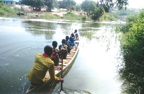 Pupils on a canoe without life jackets