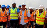 Sports Minister Isaac Asiamah (3rd from right) interacting with the contractor and the NYA boss