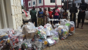 The alleged suspects with the illegal products confiscated