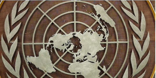 The United Nations (UN) logo displayed inside the General Assembly Hall in New York City, US