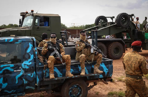 Burkina Faso's servicemen stand guard