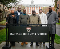 Julius Debrah at Harvard University with some of his team members