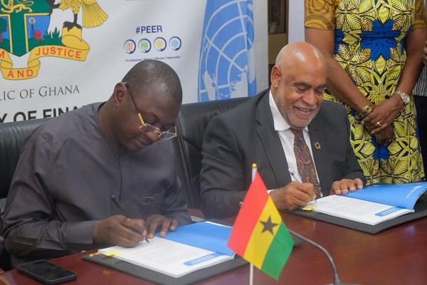 Dr. Mohammed Amin Adam and Charles Abani, UN Resident Coordinator in Ghana