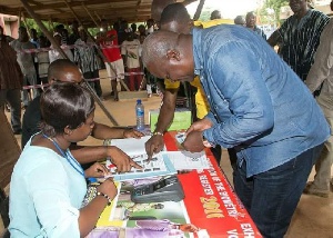 President John Dramani Mahama verifying his name