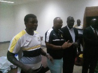 Deputy Sports Minister Pius Hadzide with the Black Stars B in Togo