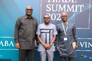 Simon Madjie and his team at the summit
